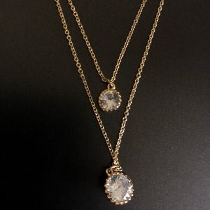 Fashion Nova something about her necklace. (Gold)